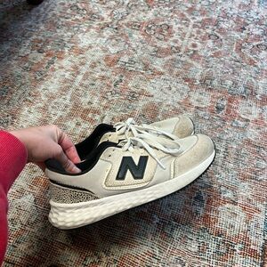 New Balance Beige and Black Sneakers